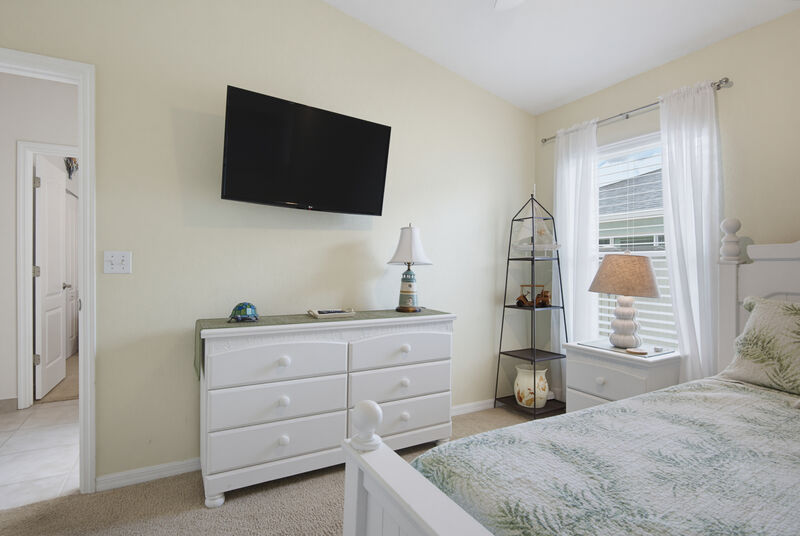 Bedroom with smart TV — the Lighthouse, New Smyrna Beach
